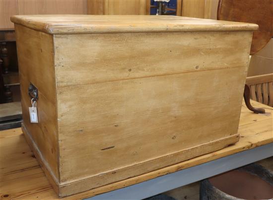 A large Victorian pine chest with rising top W.100cm